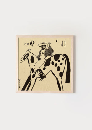 Cowgirl on spotted horse